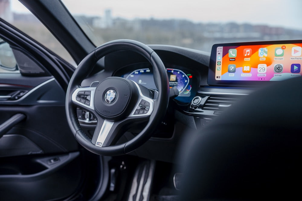 Digital cockpit of a BMW with instrument display and infotainment